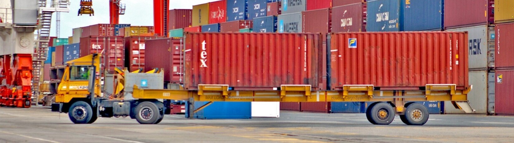 Photo of a container truck in use at a container terminal.