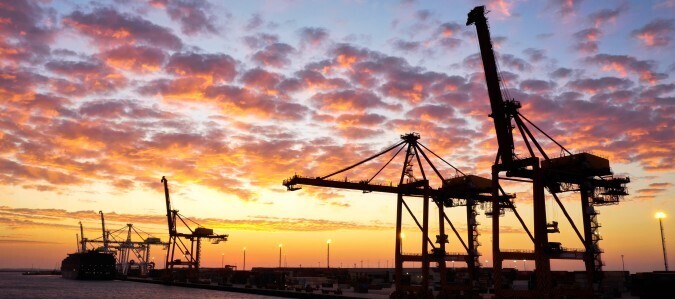 Ship to shore cranes in Fremantle at sunset