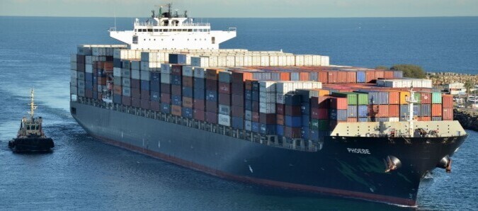 Photo of container laden vessel arriving at a port