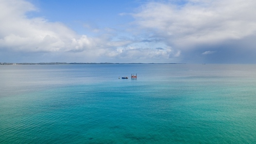 A long-distance photo of marine geotechnical investigations in the Cockburn Sound.