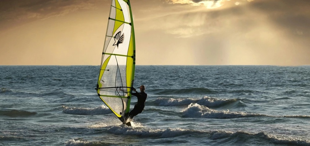 Windsurfer on the water Windsurfer on the water
